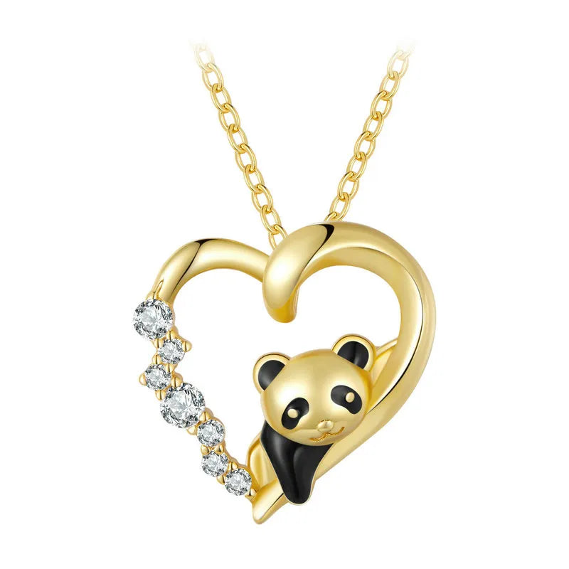 Collar de plata con colgante de corazón adornado con circonita y oso panda